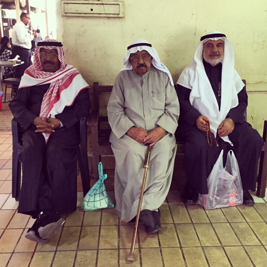 Shoppers at Kuwait traditional market